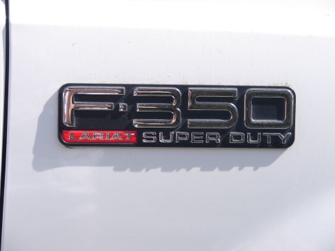1973 Ford Ranchero - Close-up of an F-350 Lariat Super Duty emblem.
