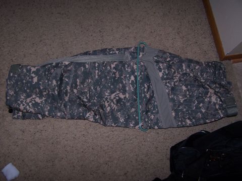 1986 Ford Bronco - A digital camouflage bag is shown hanging on a hanger.