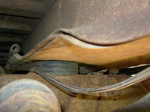 1983 Ford Bronco - The polyurethane body mounts aren't collapsed or compressed, but the body crossmember that rests on them obviously isn't right. On this sid…