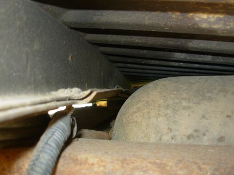 1983 Ford Bronco - The polyurethane body mounts aren't collapsed or compressed, but the body crossmember that rests on them obviously isn't right. On this sid…