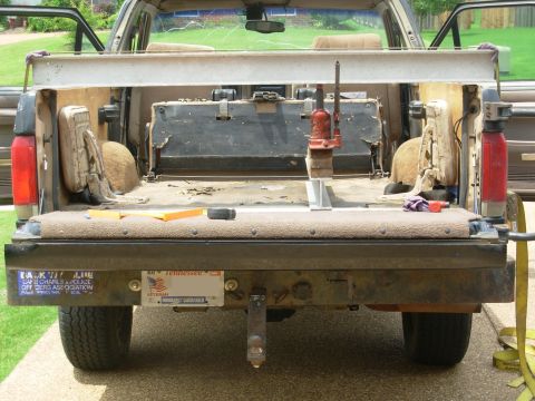 1983 Ford Bronco - As tension rises in the strap, there's a lot of groaning. The short beam is directly above the kink in the body crossmember, INboard of the…