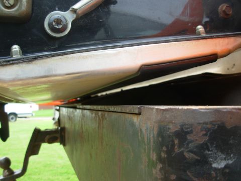 1983 Ford Bronco - The rubber pad on the bumper lid is now barely touching the t/g trim panel, just like when I installed the t/g ~7 years ago, and the cables…