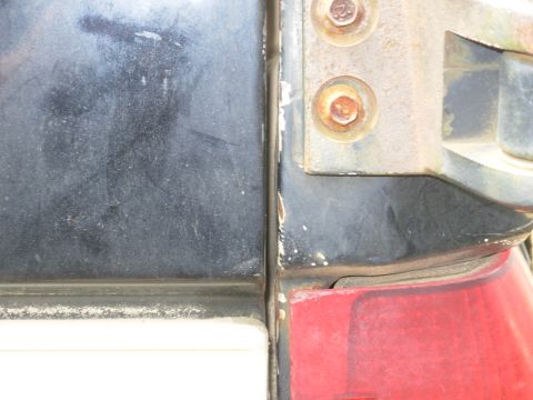 1983 Ford Bronco - The tailgate gap should be the same at the top as at the bottom. If it's too wide at the top, the bedrails need to be bent inward.