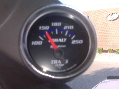 1995 Ford Bronco - A Cobalt TRA 3 temperature gauge is visible inside a vehicle, indicating a reading of 150 degrees.