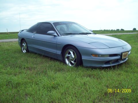 1995 Ford Probe - ride side front view of the car