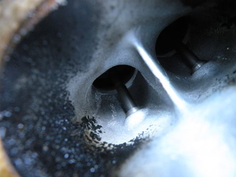 1998 Subaru Legacy - Close-up view inside an engine cylinder, showing two valves in their closed position.