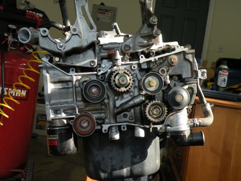 1998 Subaru Legacy - Subaru EJ25 engine assembly, likely from a 2000s model, undergoing maintenance or rebuild.