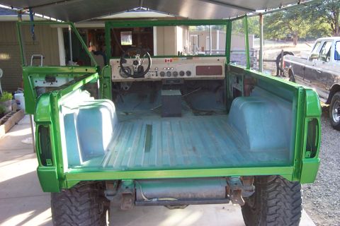 1976 Ford Bronco - This 1976 Ford Bronco is shown with its doors removed, revealing the interior and cargo bed.