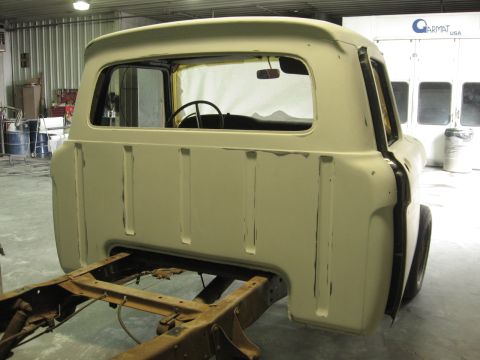 1966 Ford F-100 - The truck is in a workshop, undergoing preparation for a new paint job.
