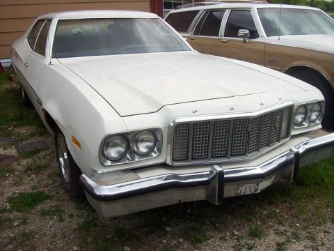 1976 Ford Torino - January 2009 picture of the right front with LTD II hubcaps installed.