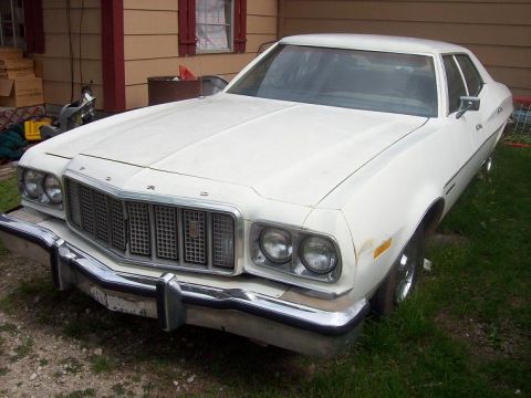 1976 Ford Torino - January 2009 picture of the left front with LTD II hubcaps installed.