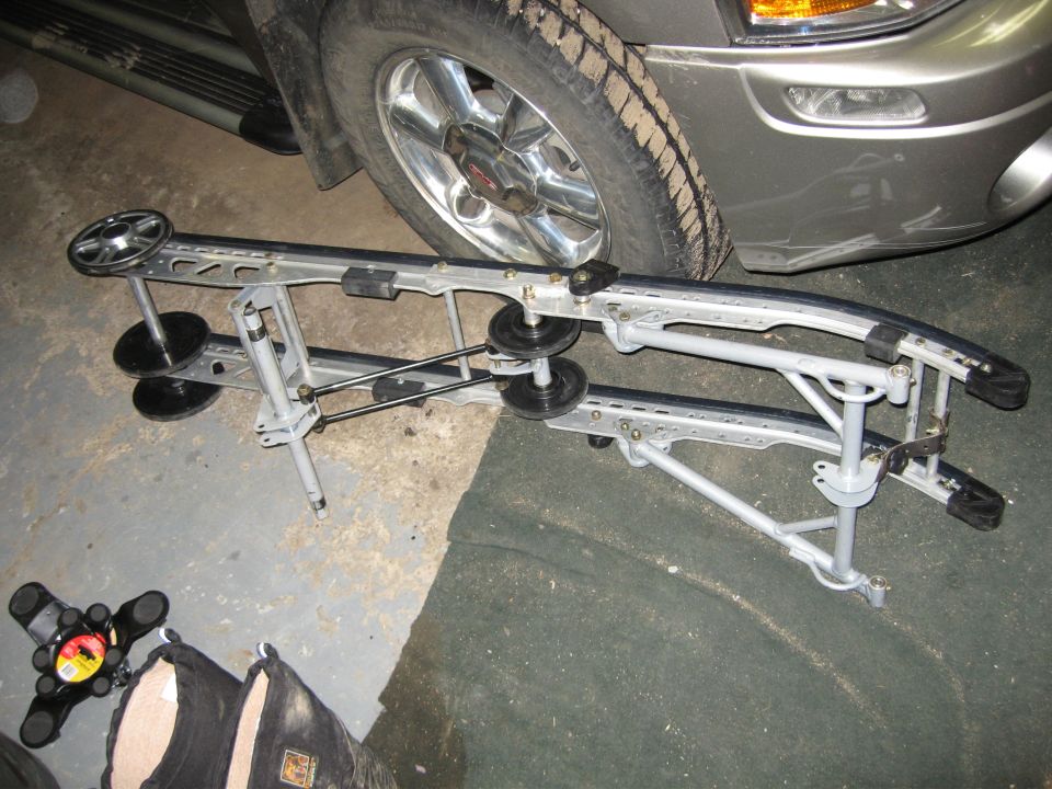 1 rear skid from 03 Mountain cat 800 rear 144 suspension, mostly complete, arms, rails, etc - $300
