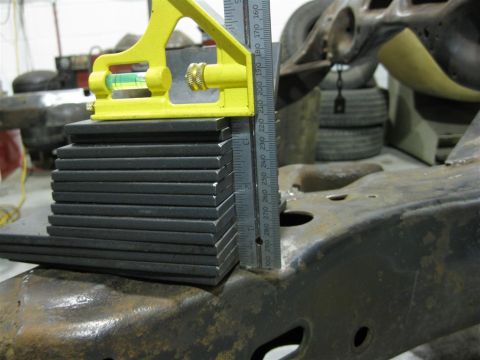 1984 Ford LTD Crown Victoria - 26-1/2 lbs (!!) of 1/4" thick mounting plate material before fitting and trimming.