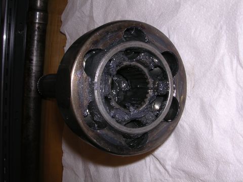 1983 Ferrari Enzo - Close-up of a CV joint, showing the internal components and grease packing.