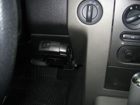 1979 Ford Bronco - A digital trailer brake controller is installed in the vehicle's interior, near the driver's side.