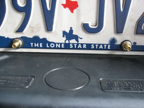 1979 Ford Bronco - Close-up of a Texas license plate, displaying state motto and imagery.