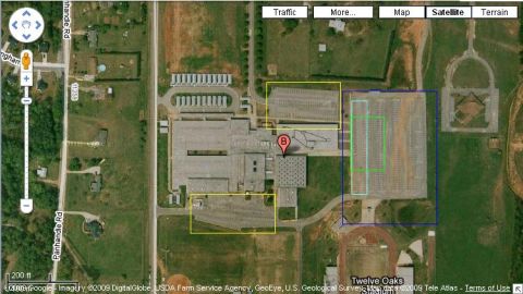 1993 Ford Probe - Satellite image shows a large building complex with multiple parking areas and surrounding roads.