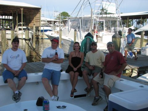 1979 Ford F-150 - A group of friends enjoys a day at the marina, with several boats docked around them.