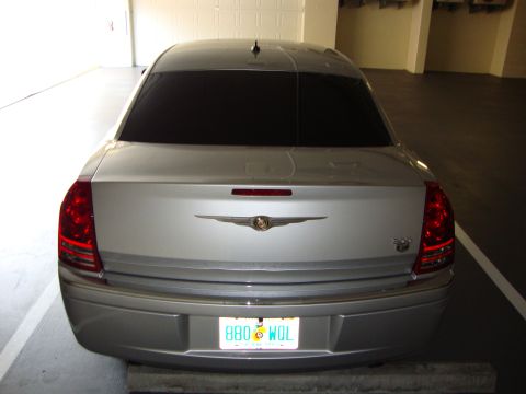 2008 Chrysler 300 - Rear view of a silver Chrysler 300, tinted windows and a custom license plate.