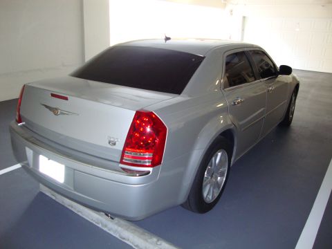 2008 Chrysler 300 - Rear view of a silver Chrysler 300 sedan parked indoors.