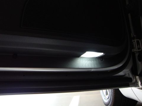 2008 Chrysler 300 - Illuminated interior door light, likely a custom LED upgrade.