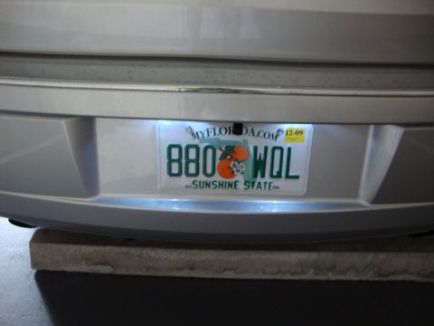 2008 Chrysler 300 - The rear of a vehicle is shown, a Florida license plate with an expiration date of December 2009.