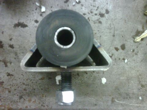 1996 Ford Bronco - This is a close-up view of a motor mount part, not a 1996 Ford Bronco.
