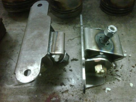 1996 Ford Bronco - Custom motor mounts fabricated from steel, shown with hardware.