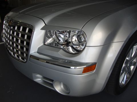 2008 Chrysler 300 - Front view of a silver 2008 Chrysler 300, highlighting its distinctive grille and headlight design.