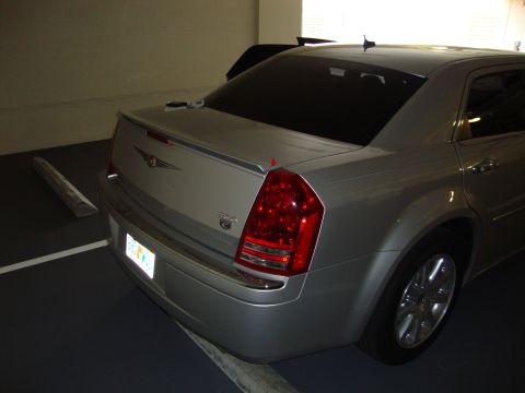 2008 Chrysler 300 - Rear view of a silver Chrysler 300 sedan parked in a garage.