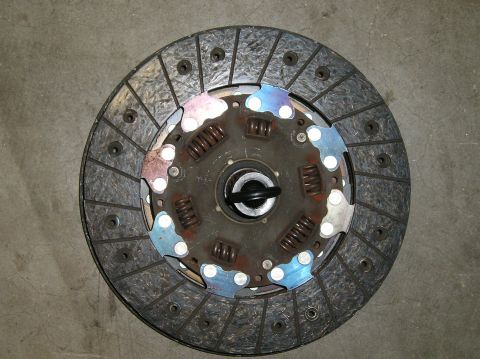 1986 Toyota Hilux - Clutch disc shown from above, resting on a concrete surface.