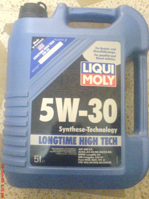 1992 Ford Crown Victoria - A blue plastic container of Liqui Moly 5W-30 Longtime High Tech synthetic oil is shown.