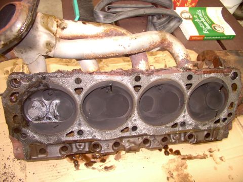 1986 Ford Bronco - Think I'll put the headers and header gaskets back on the heads before I put the heads on the block. Might even index the plugs while the h…