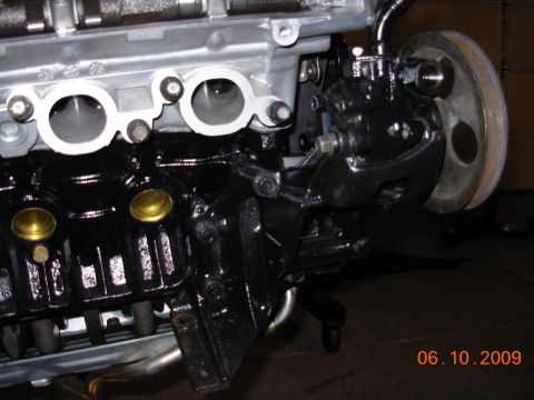 1995 Ford Taurus - Engine block and power steering pump assembly shown in detail.