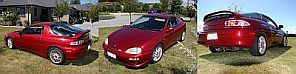 1993 Mazda MX-3 - This red 1993 Mazda MX-3 coupe is shown from multiple angles in this panoramic photo.