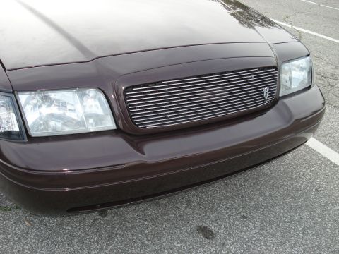 2000 Ford Crown Victoria - Front view of a 2000 Ford Crown Victoria showing its custom grille and headlights.