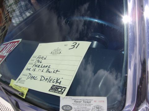 1970 Ford Ranchero - A sign on the dashboard of a 1966 Ford Fairlane lists its details and owner's name.