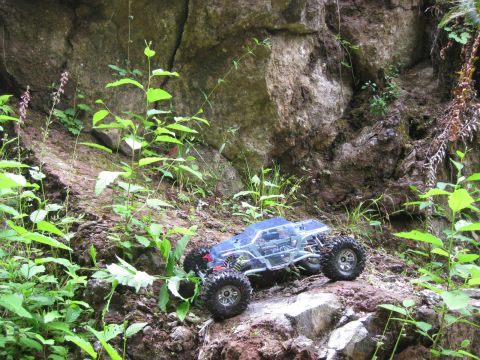 2010 Ford Pickup - A remote-controlled rock crawler navigates a , natural obstacle course.