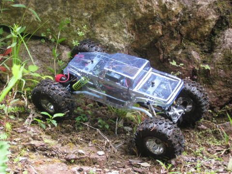 2010 Ford Pickup - This remote-controlled rock crawler navigates a challenging rocky path, its suspension and off-road capabilities.