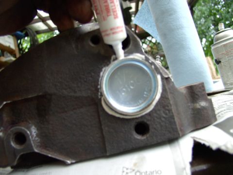 1986 Ford Bronco - Some people knock them in dry, but I find Loctite thread sealer works well to seal them up.