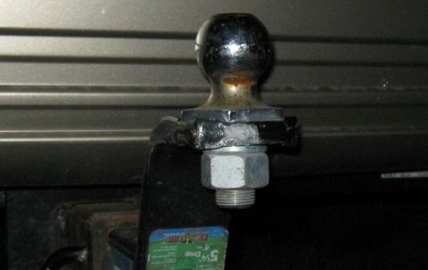 2000 Mercury Grand Marquis - A close-up view of a trailer hitch ball, with a label indicating a 5/16 inch drop.