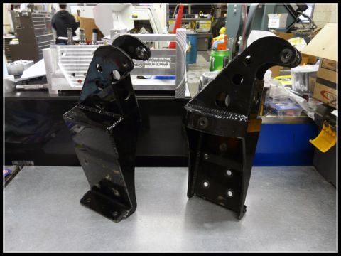 1989 Ford Bronco - These appear to be custom or aftermarket brackets, possibly for off-road vehicle modification.
