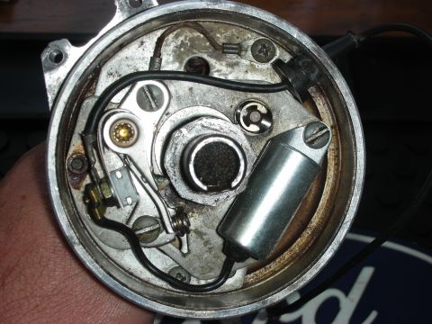 1968 Shelby GT500 - The internal components of a vehicle's distributor cap are visible in this close-up shot.