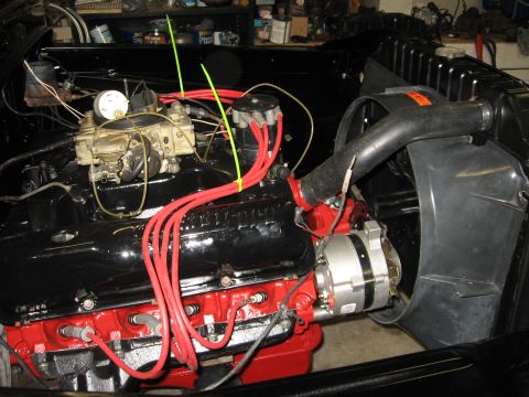 1966 Ford F-100 - Engine bay detail showing V8 engine components during re-assembly.