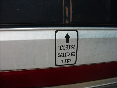 1979 Ford F-150 - A "THIS SIDE UP" sticker is visible on the exterior of a vehicle.