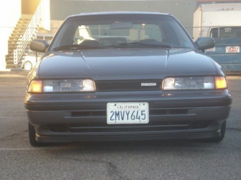 1989 Mazda MX-6 - This 1989 Mazda MX-6 is seen from the front, displaying its California license plate.