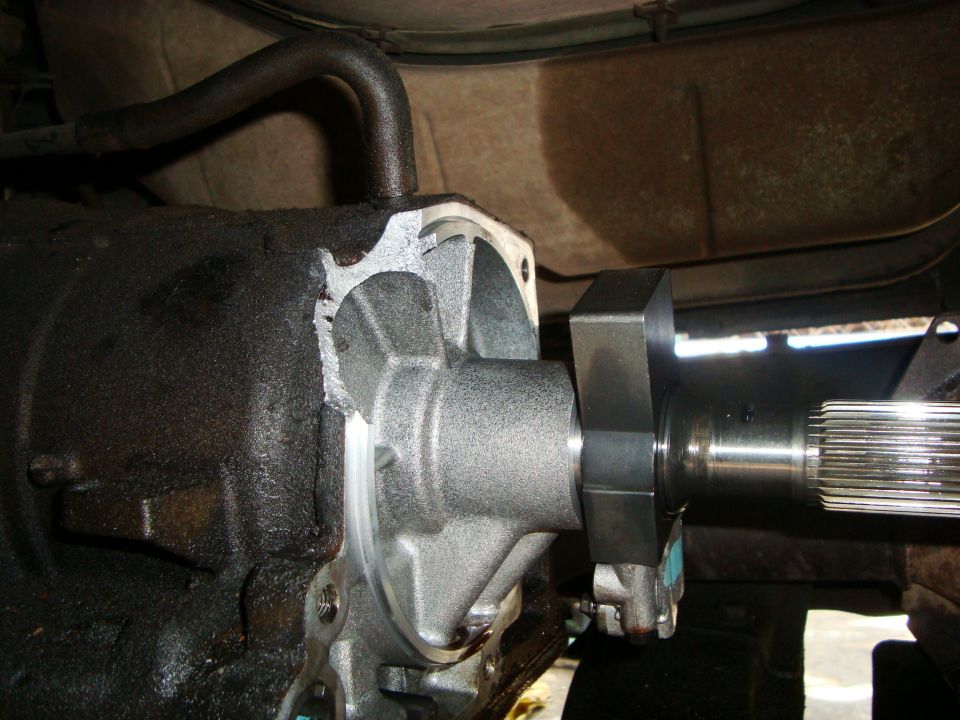 close-up of a transmission output shaft seal being installed