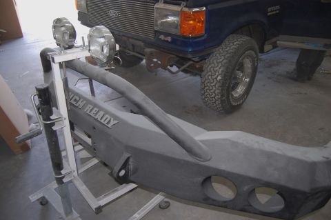 1989 Ford Bronco - A blue 1989 Ford Bronco is shown with a new aftermarket bumper and auxiliary lights installed.