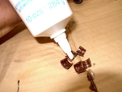 1986 Ford Bronco - Unless you have three hands a little dab of grease on the keepers helps stick them onto the valve stem long enough for your two hands to re…