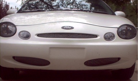 1997 Ford Taurus - Front view of a white 1997 Ford Taurus.